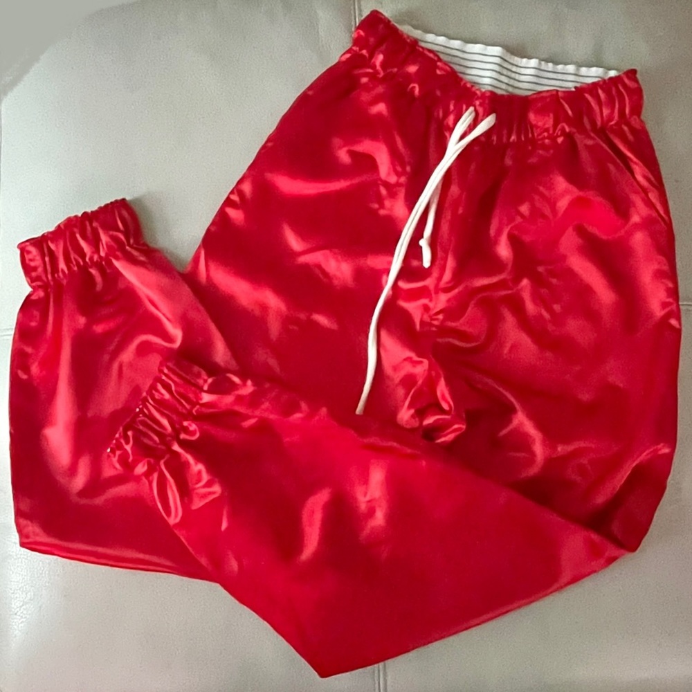 Shiny Red Joggers from Ssense (Unisex)